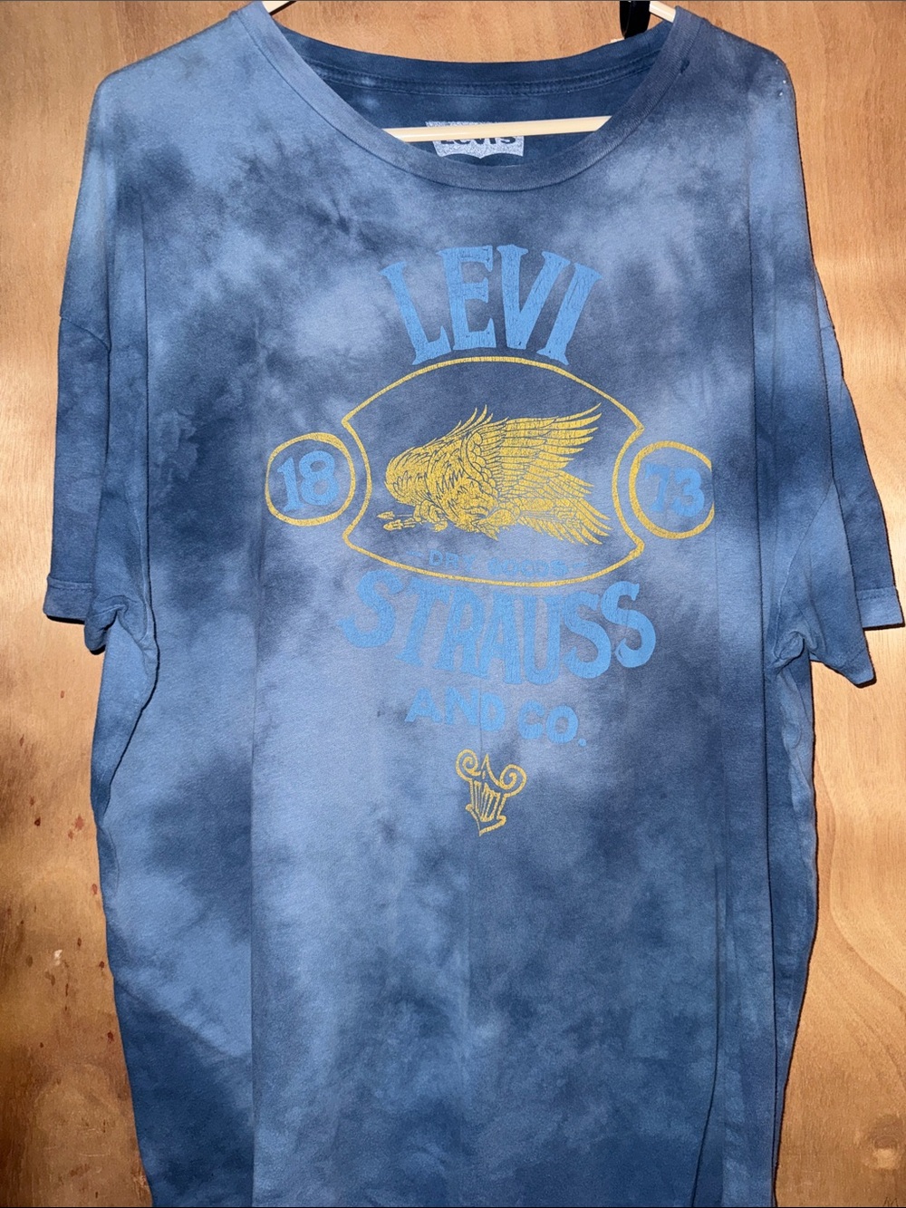 Levi's Blue Tie-Dye Tee with Gold Crest Graphic